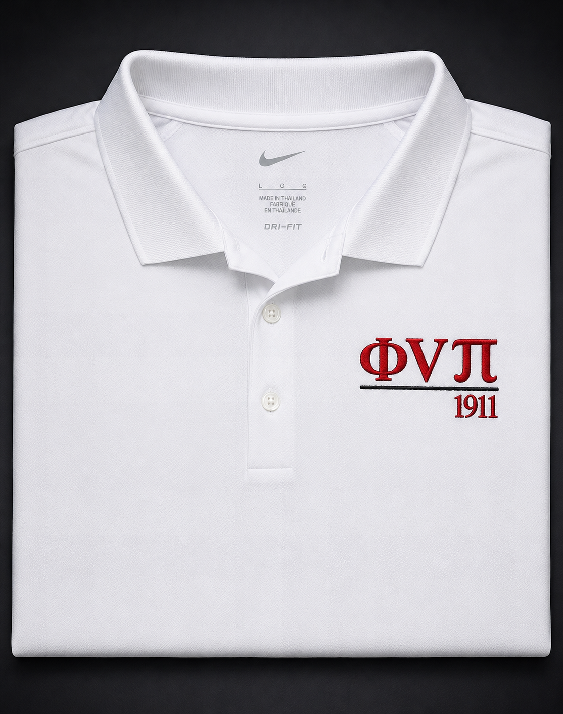 Custom embroidered white Nike Dri-FIT polo with Greek letters and year embroidery