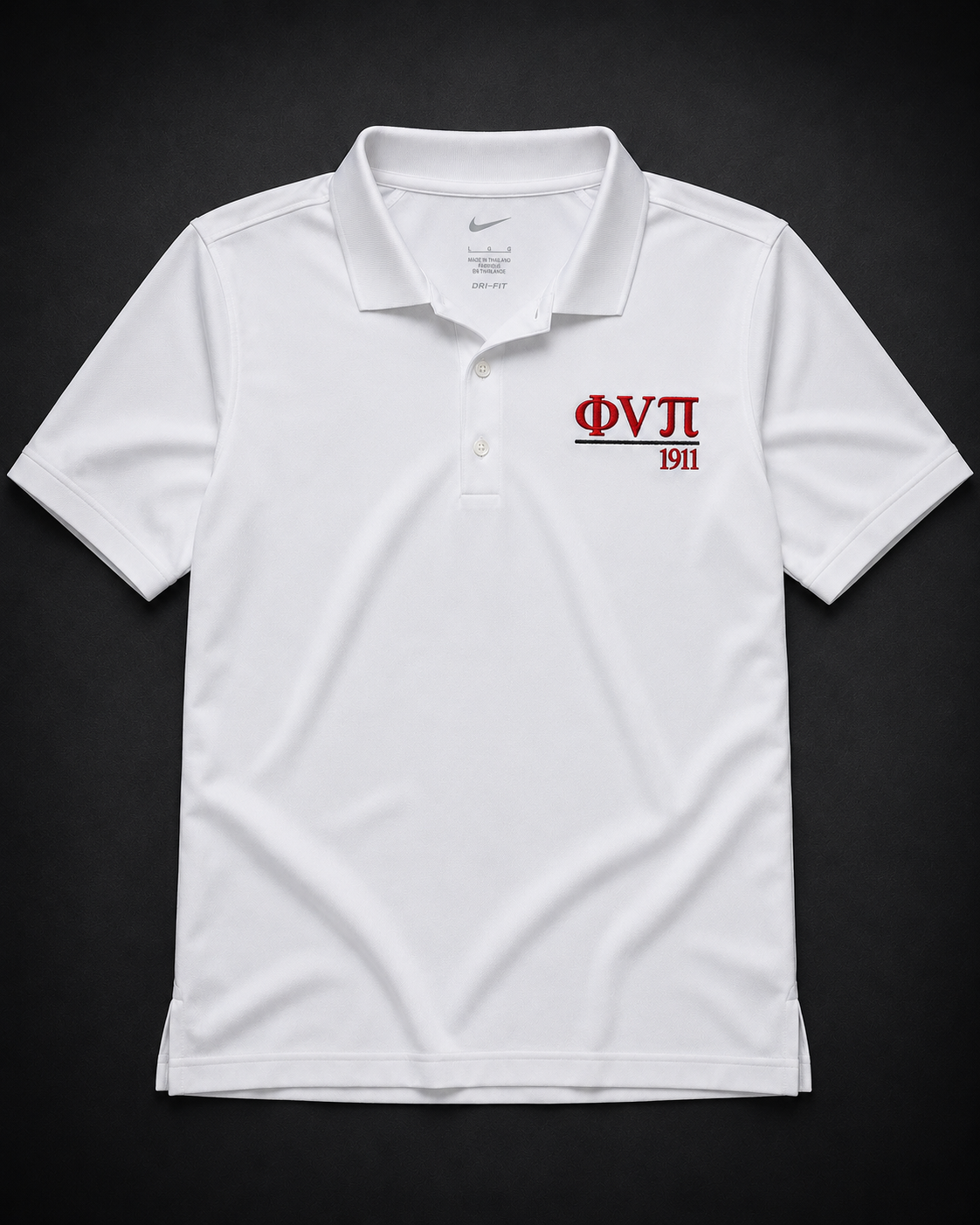 Custom embroidered white Nike Dri-FIT performance polo with crimson Greek letter abbreviation, rule line, and founding year on left chest.