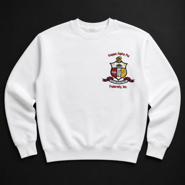 Custom full-color embroidered crewneck sweatshirt with multi-thread heraldic crest, helmet figure, gold stars, shield panels, ribbon scroll, and arched organization text.