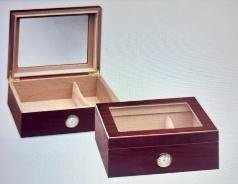 High-gloss cherry glass-top humidor standing open with Spanish cedar lining and divider