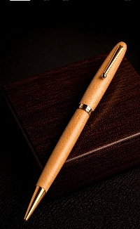 Wide maple pencil with chrome trim on a dark wood surface