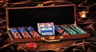 Rosewood case open to show 300 poker chips in red, white, blue and green with two card decks and dice